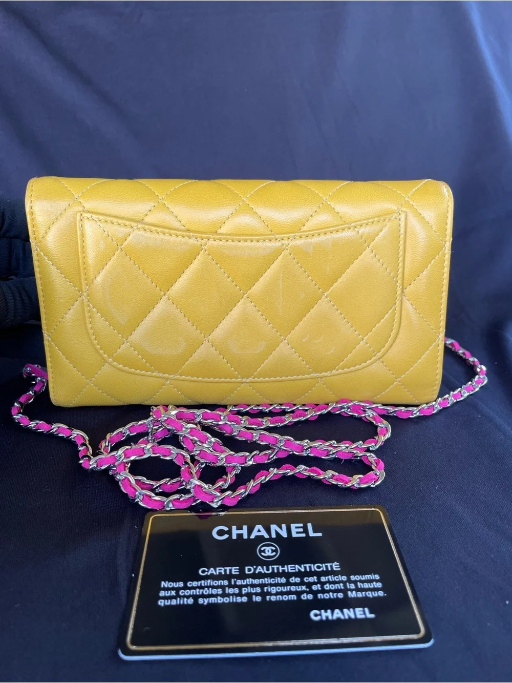 AUTH. Chanel Flap trifold wallet with silver tone hardware.